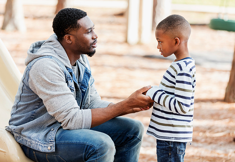 Father Speaking with Son