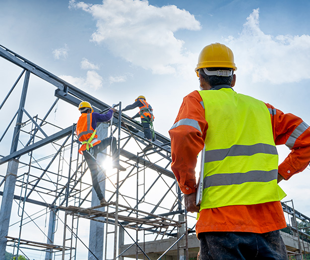 Construction worker observing the job being completed