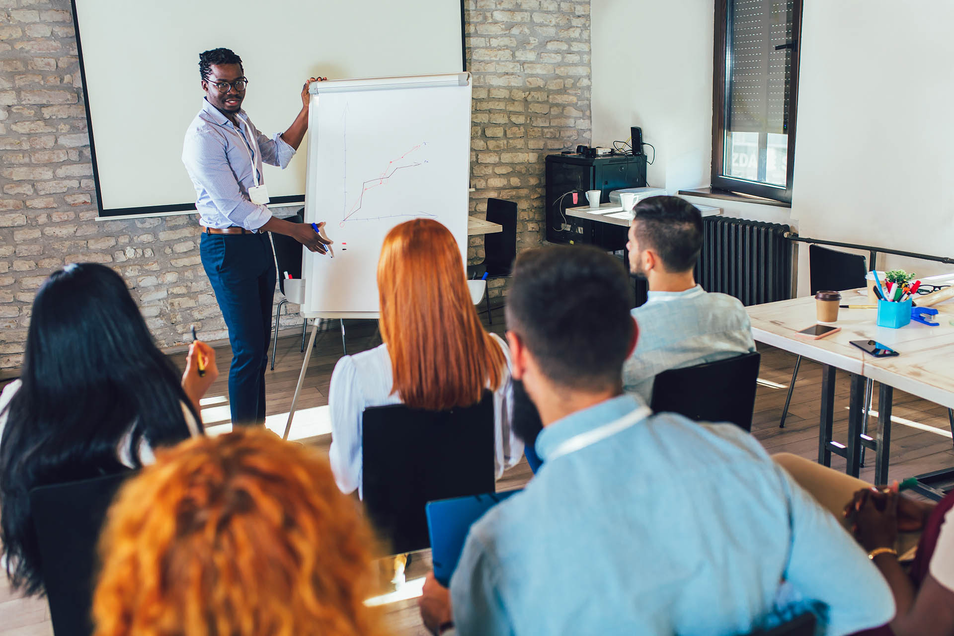 Man giving a presentation to workplace