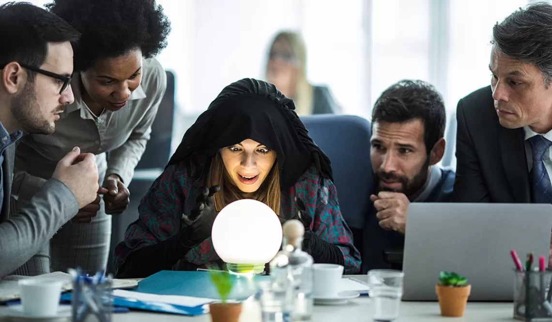 Scientists observing a fortune teller