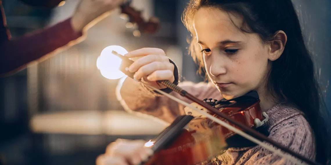 Generalists and Specialists Girl playing the violin