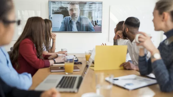 A group of business people holding a meeting