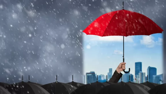 Red umbrella with sun underneath