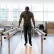 Man practicing physical therapy with bars